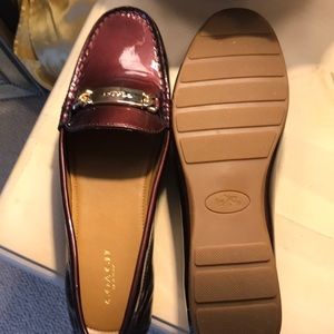 Never worn patent leather burgundy coach loafers